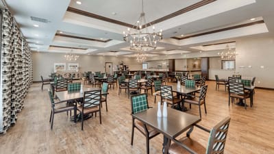 Bright dining area with tables and chairs