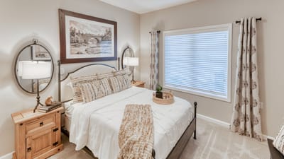 Cozy resident room with a bed and decorative elements