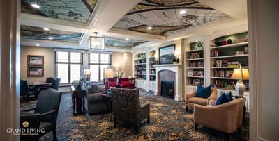 Cozy common area with bookshelves and seating