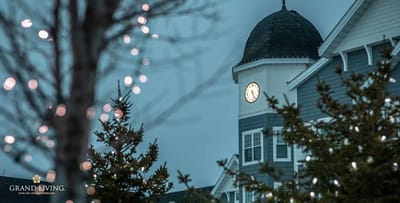 Exterior view of Grand Living at Indian Creek with clock tower
