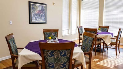 Bright dining area with tables set for meals