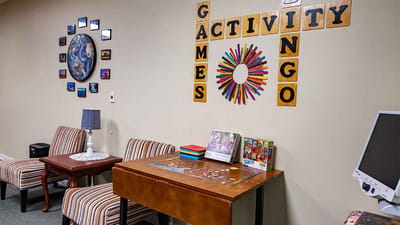 Activity room with games and tables for residents