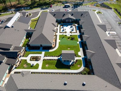 Aerial view of a senior living courtyard and garden