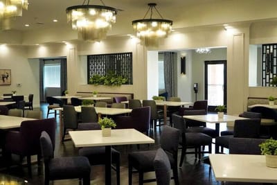 Interior dining area with tables and chairs