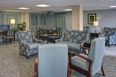 Common area with comfortable seating in a bright lounge