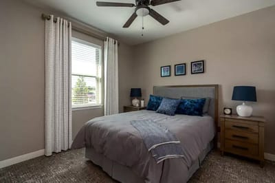 Cozy private resident room with a bed and decor