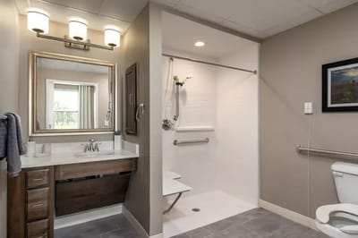 Bright, modern bathroom in a senior living unit