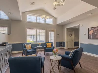 Bright common area with seating and flowers