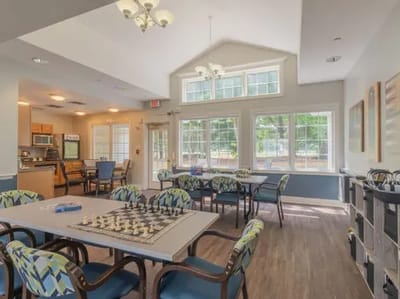 Common area with chess board in a well-lit room