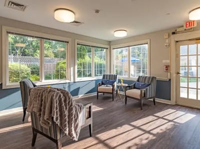 Cozy common area with seating and large windows