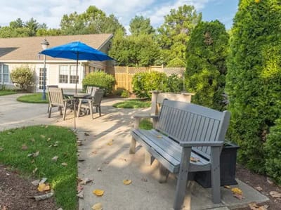 Seating area with umbrella in a garden space