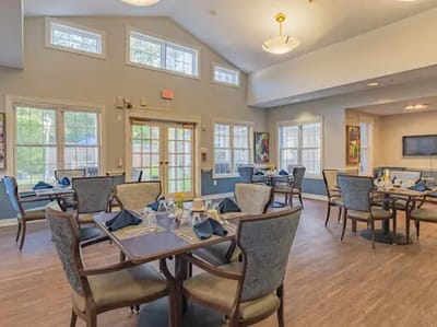 Dining area with tables set for a meal