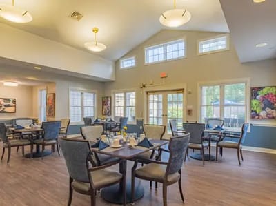 Dining room with tables set for a meal