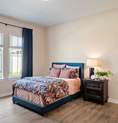 Private resident bedroom with floral bedding