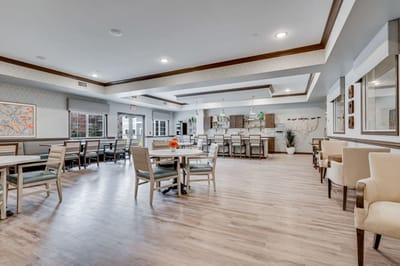 Bright interior of a dining area with tables and chairs