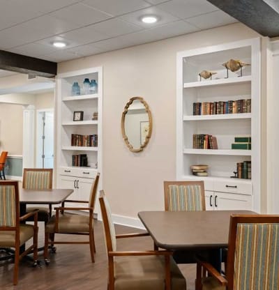 Interior common area with bookshelves and seating