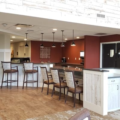 Interior view of a common area with seating and a bar