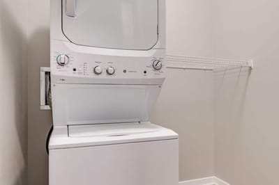 Stacked washer and dryer in a laundry area