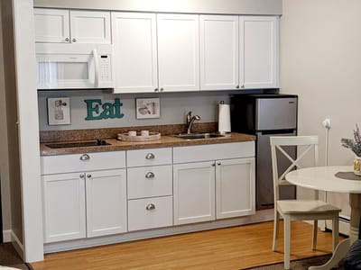 Well-equipped kitchenette in a resident room