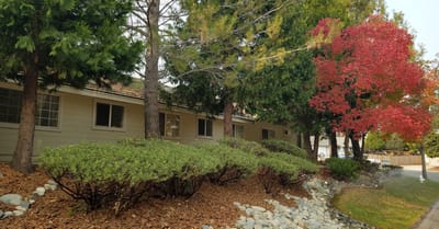 Outdoor view of the facility with landscaped greenery