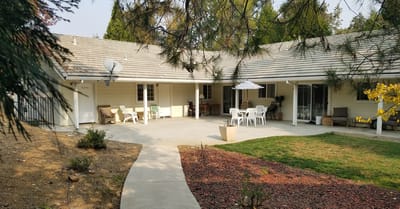 Outdoor patio area with seating at the facility