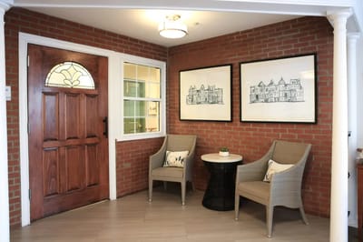 Cozy seating area with artwork in a lobby
