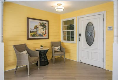Bright and inviting interior entrance area with seating