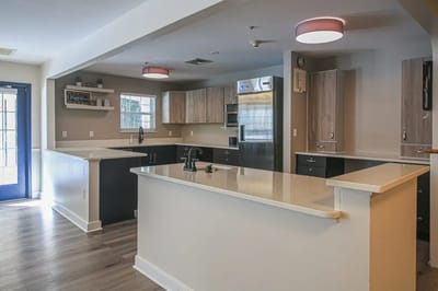 Modern common area kitchen in a senior living facility