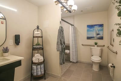 Modern bathroom with towels and decor
