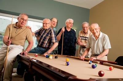 Residents enjoying a game of billiards together