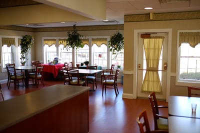 Dining area with tables and plants