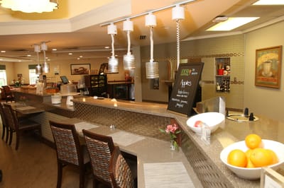 Interior dining area with a counter and fruit bowls
