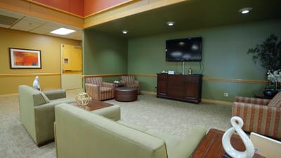 Common area seating in a cozy lounge