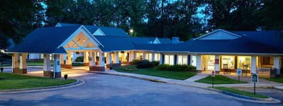 Exterior view of Hillcrest Convalescent Center at dusk