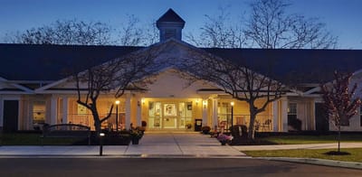 Exterior view of Glenwell assisted living facility at dusk
