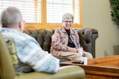 Residents enjoying conversation in a common area