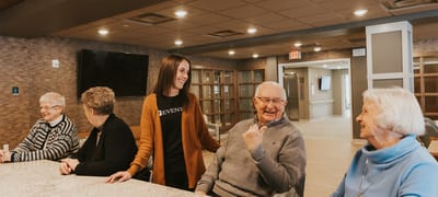 Residents enjoying conversation in a common area