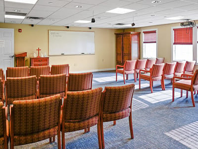 Interior view of a multi-purpose activity room with chairs