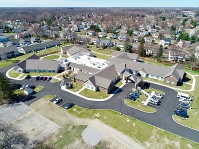 Aerial view of Charter Senior Living facility with surrounding area