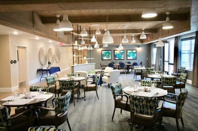 Bright dining room with tables and comfortable seating