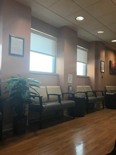 Interior view of a waiting area with chairs