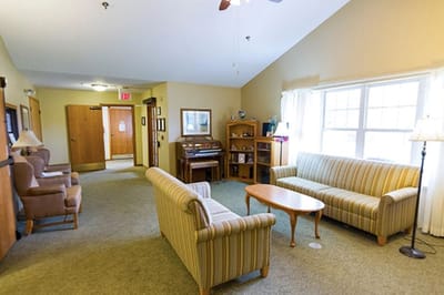 Bright common area with seating and decor