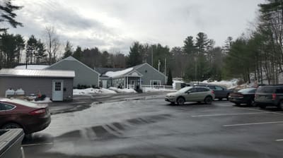 Exterior view of the facility with parking lot