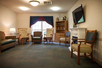 Common area with seating and a television