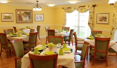 Dining room set for a meal with colorful decor