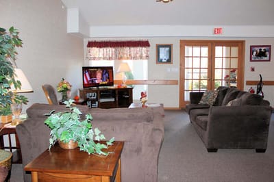 Cozy common area with sofas and a television