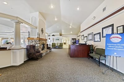 Interior view of a cozy common area with seating