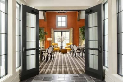 A bright lobby area with comfortable seating