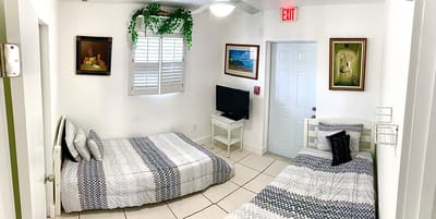 A bright private room with beds and decorations