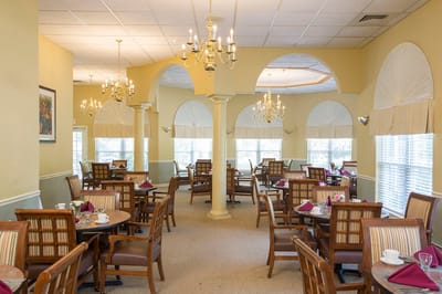 Bright dining room with elegant decor and table settings